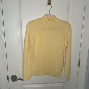 Pastel yellow turtle neck.